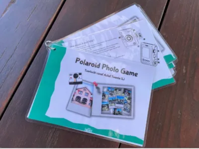 polaroid photo game toertocht boekje